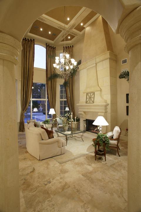 Traditional Living Room with ceiling to floor drapes