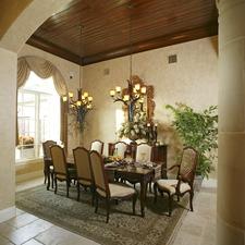 Traditional Dining Room with light gold custom window treatment