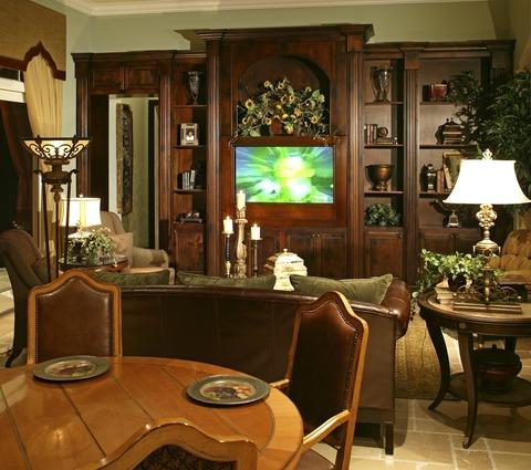 Traditional Living Room with light wood dining chairs with dark brown leather cushions