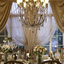 Traditional Dining Room with gold gilded dining chairs