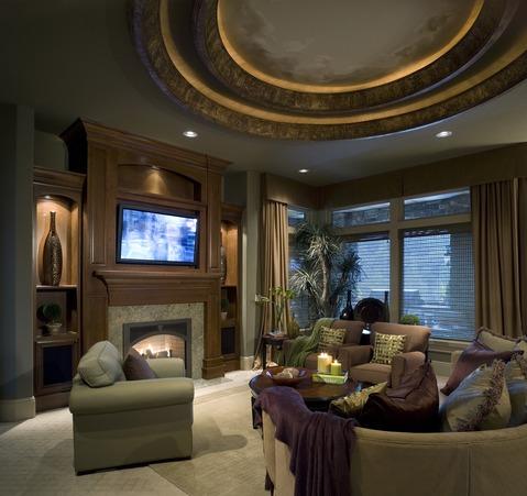 Contemporary Family Room with tiled fire place surround