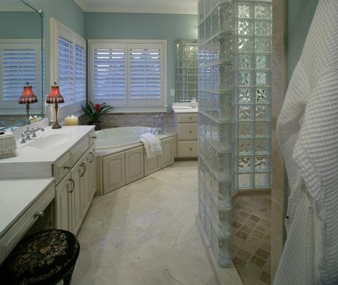 Transitional Bathroom with light tan stone tile shower flooring