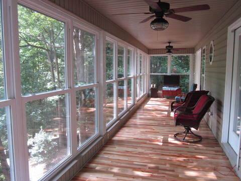 Contemporary Sunroom with vinyl clad double hung windows