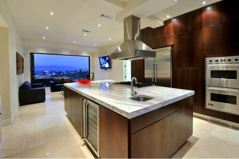 Modern Kitchen with kitchen island with plenty of storage