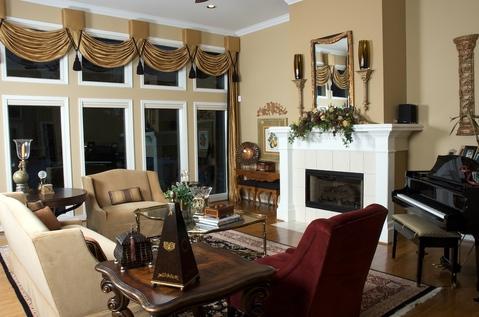 Traditional Living Room with white tile fireplace surround