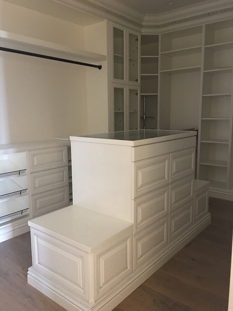Traditional Closet with closet island with jewelry cabinet
