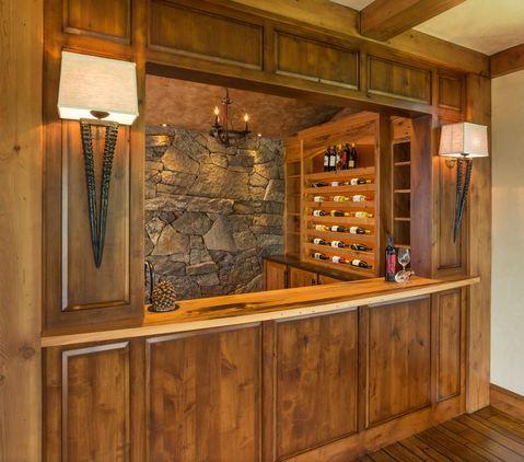 Rustic Wine Cellar with variegated width wood floor