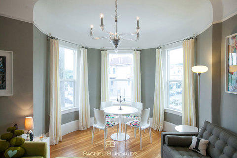 Eclectic Dining Room with silk curtain drape window covering