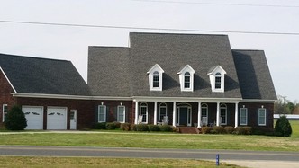 Marty Price Construction logo