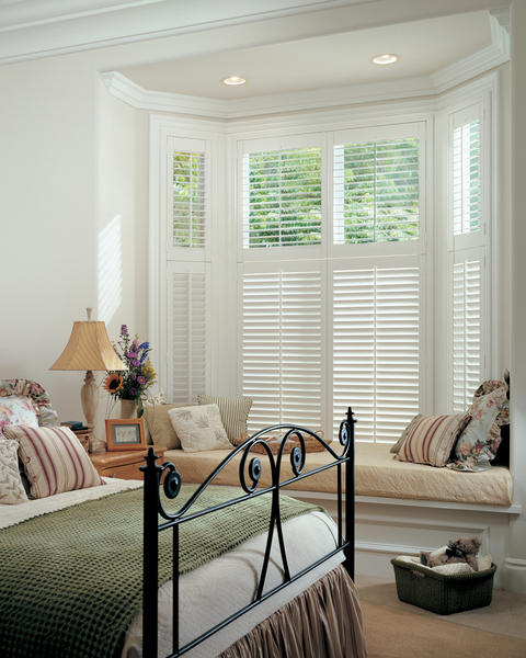 Casual / Comfortable Bedroom with white plantation shutters