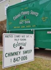 A Colonial Chimney Sweep logo