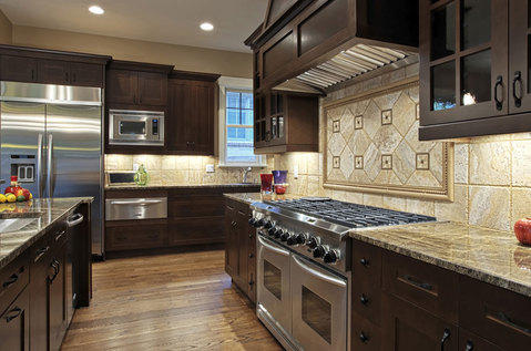 Modern Kitchen with full tile backsplash with framed mosaic accent