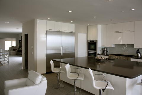 Modern Kitchen with white and metal modern barstools