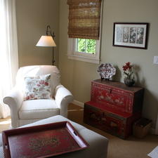 Transitional Library with white overstuffed arm chairs