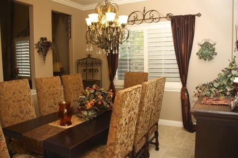 French Dining Room with upholstered dining chairs