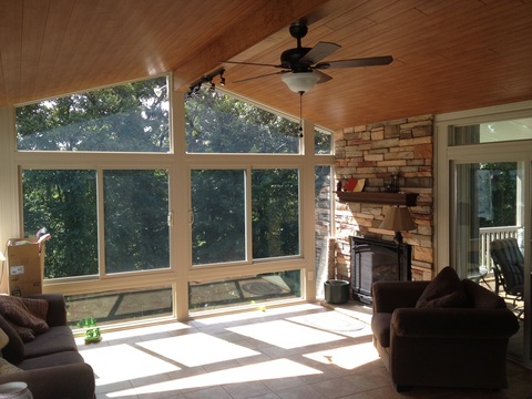 Contemporary Sunroom with wood panel ceiling