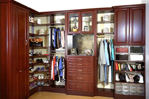 Traditional Closet with raised panel cabinets