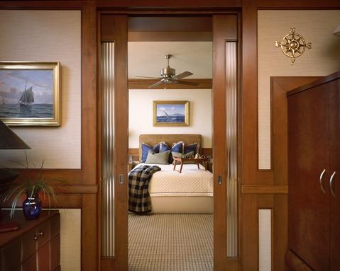 Eclectic Bedroom with textured glass panel doors