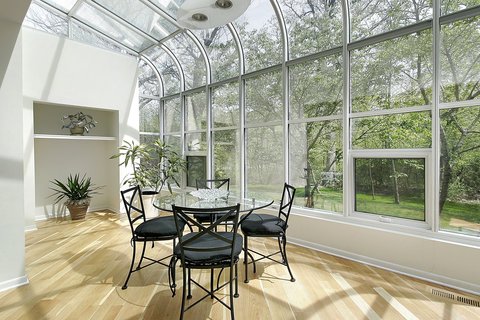 Contemporary Sunroom with cafe table and chairs