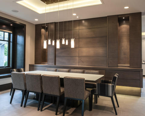 Modern Dining Room with striped upholstered armed dining chairs
