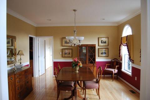 English Dining Room with hanging dining light fixtures