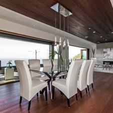 Modern Dining Room with white leather high back dining chairs