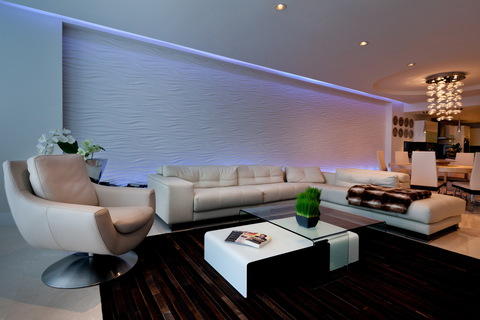 Modern Family Room with modern style family room with a textured accent wall