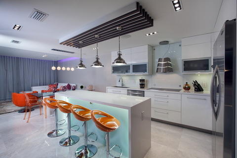Modern Kitchen with modern style kitchen with white cabinetry and orange barstools