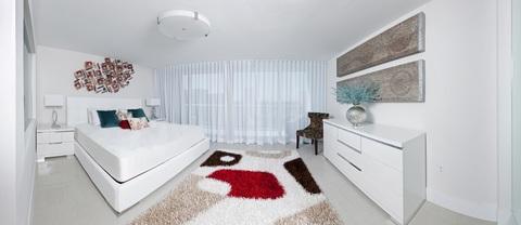Contemporary Bedroom with side lamp with metal base and white shade