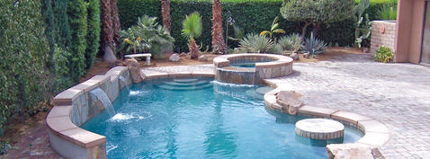 Eclectic Pool with flagstone spa surround