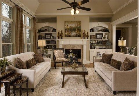 Traditional Living Room with white built in bookcases