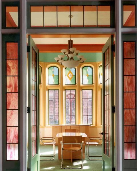 Eclectic Dining Room with skinny door side windows