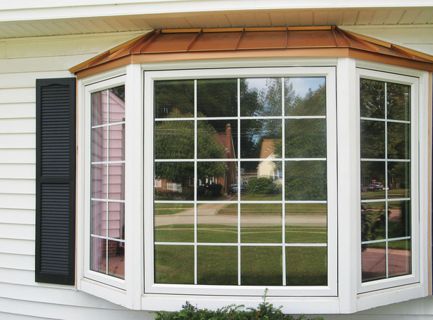 Traditional Home Exterior in West Seneca - dark wood window shutter ...