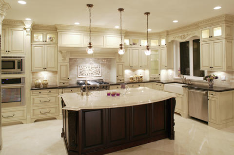 Transitional Kitchen with a light and bright transitional kitchen with large dark island