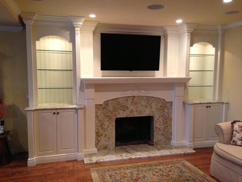 Traditional Living Room with granite fireplace surround