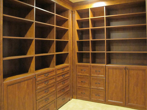Traditional Closet with custom built in shelves