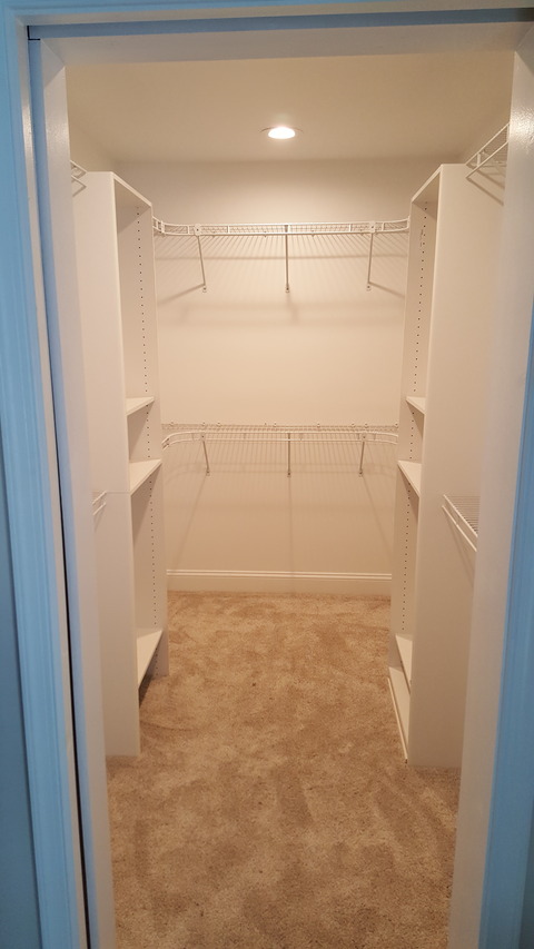 Traditional Closet with adjustable shelving