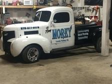 TM Morey logo