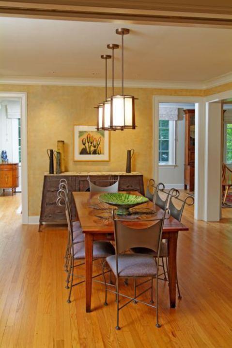 Eclectic Dining Room with eight person dining table