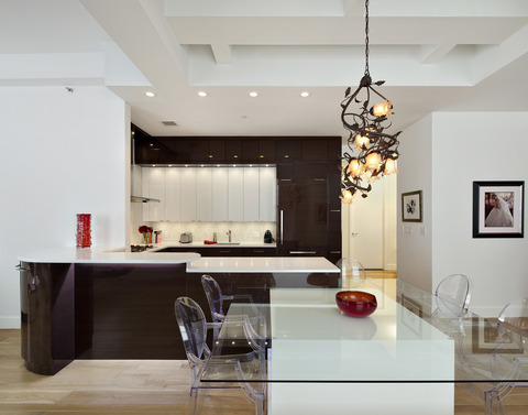 Modern Kitchen with darkly stained italian cabinets