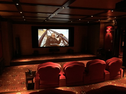 Traditional Home Theater with red theater seats