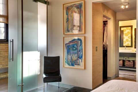 Contemporary Bedroom with wall mounted bathroom vanity
