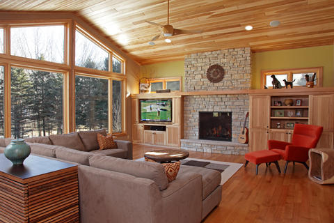 Contemporary Family Room with full stone faced fireplace