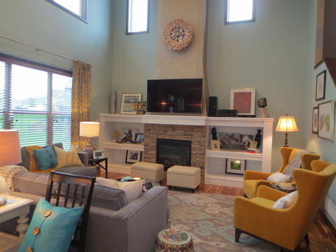 Eclectic Family Room with gray and yellow drapery