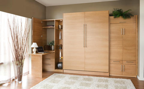 Contemporary Bedroom with brushed nickel cabinet handles