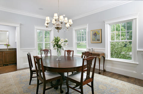 Transitional Dining Room with lamp shade chandelier