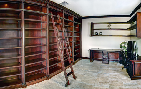 Traditional Library with large home office with built in library
