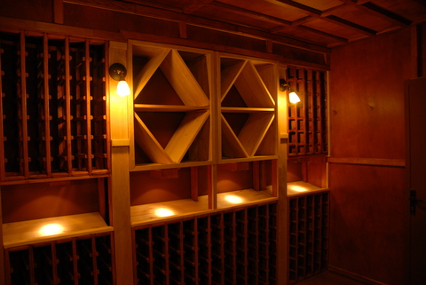 Casual / Comfortable Wine Cellar with coffered ceiling