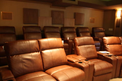 Traditional Home Theater with brown leather theater chair
