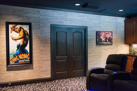 Traditional Home Theater with seagrass wall covering